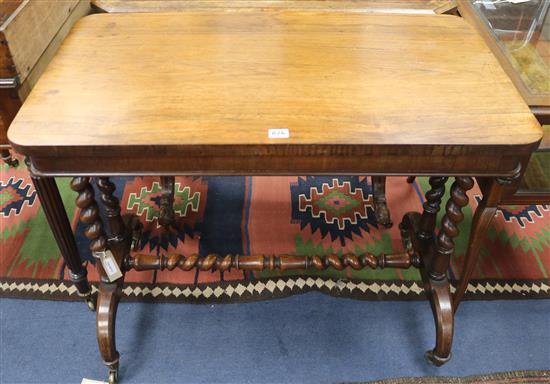 A Victorian rosewood centre table, on barley twist end supports and splayed feet with brass caps and castors, W.90cm